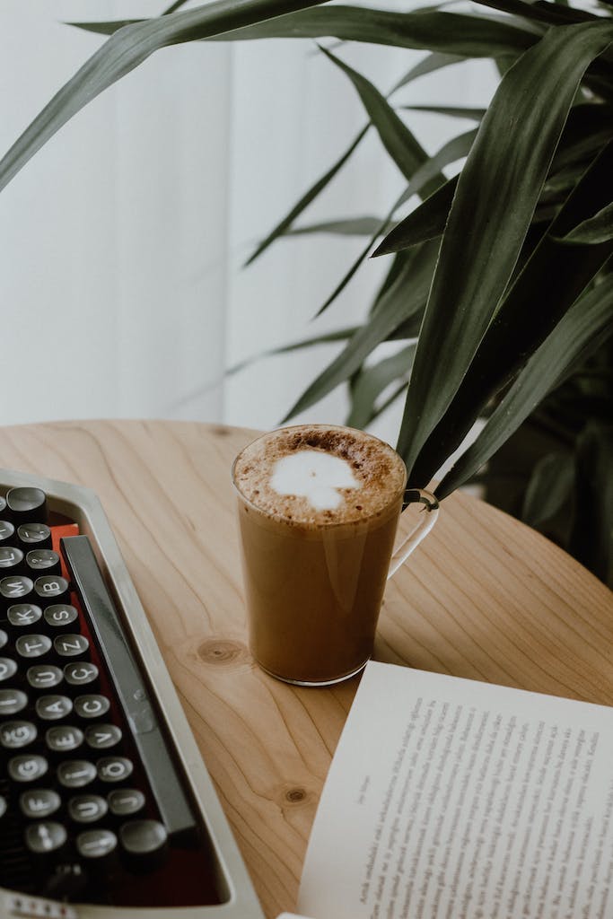 Sprinkling coffee grounds on houseplant