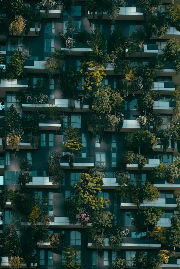 Urban balcony garden with vertical planters and vegetables.